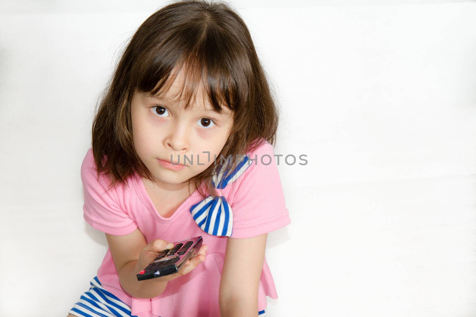 Asian child with remote control