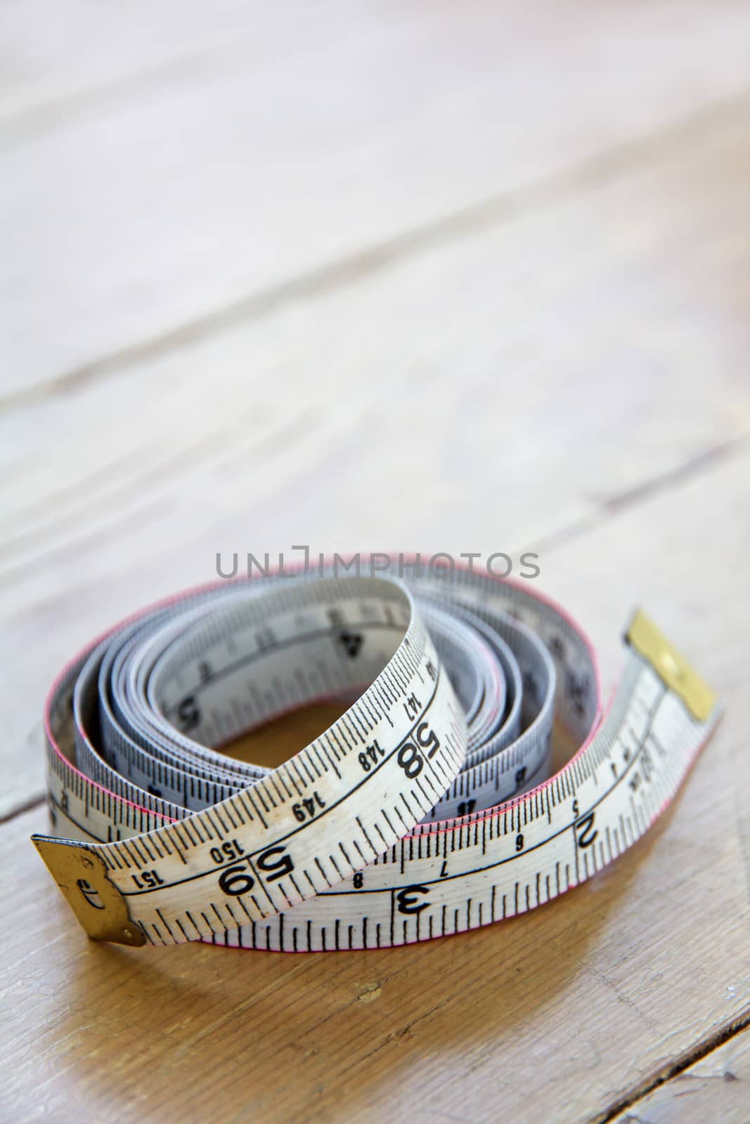 close up of tape measure by ponsulak