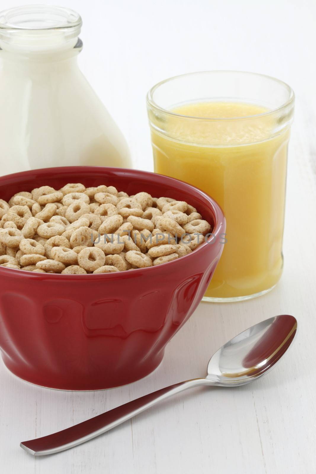 Delicious and nutritious lightly toasted honey, nuts and oats cereal with milk.