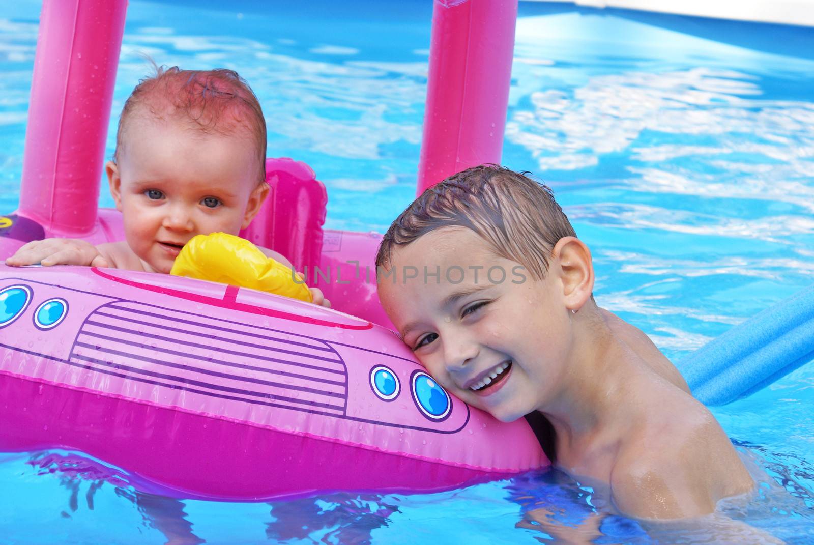 Siblings Enjoying the Pool by AlphaBaby