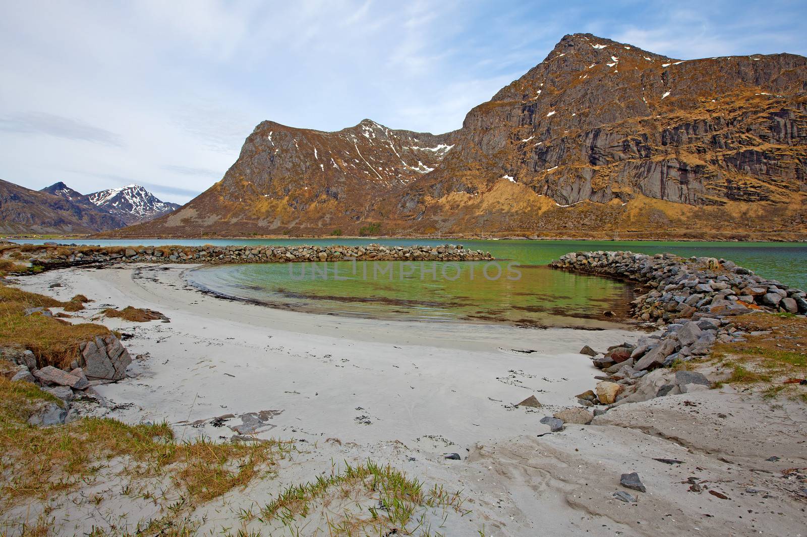 Snowcapped mountains and blue water, Norwegian fjord