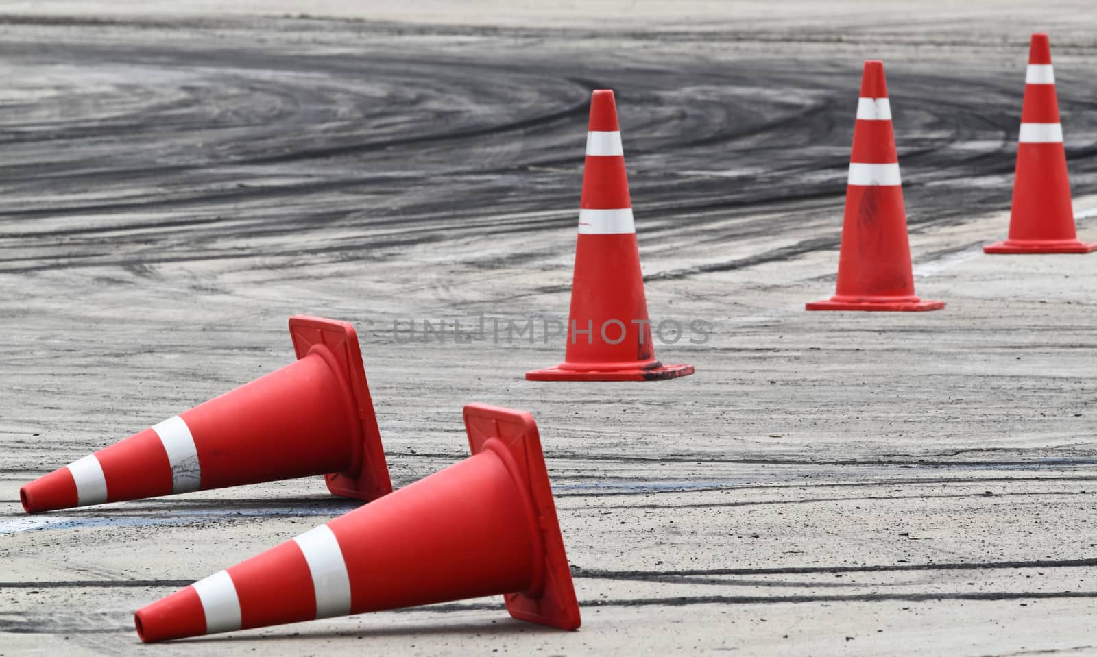 Background with traffic cone on road track