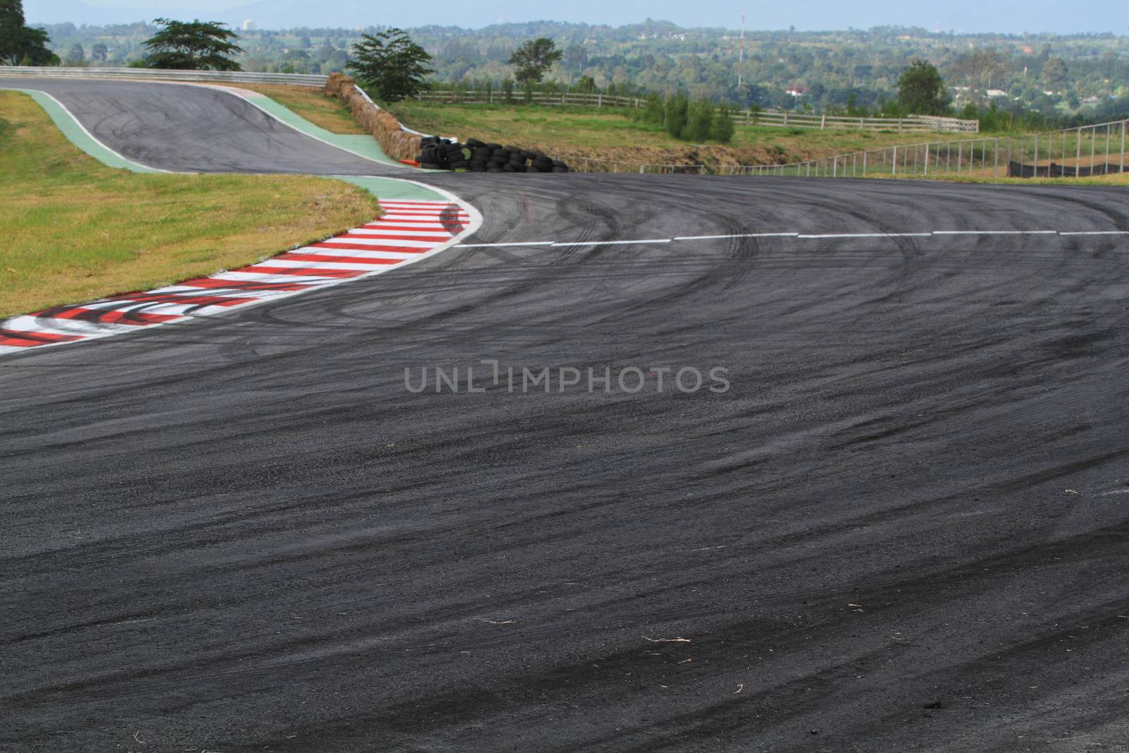 Background with tire marks on road track