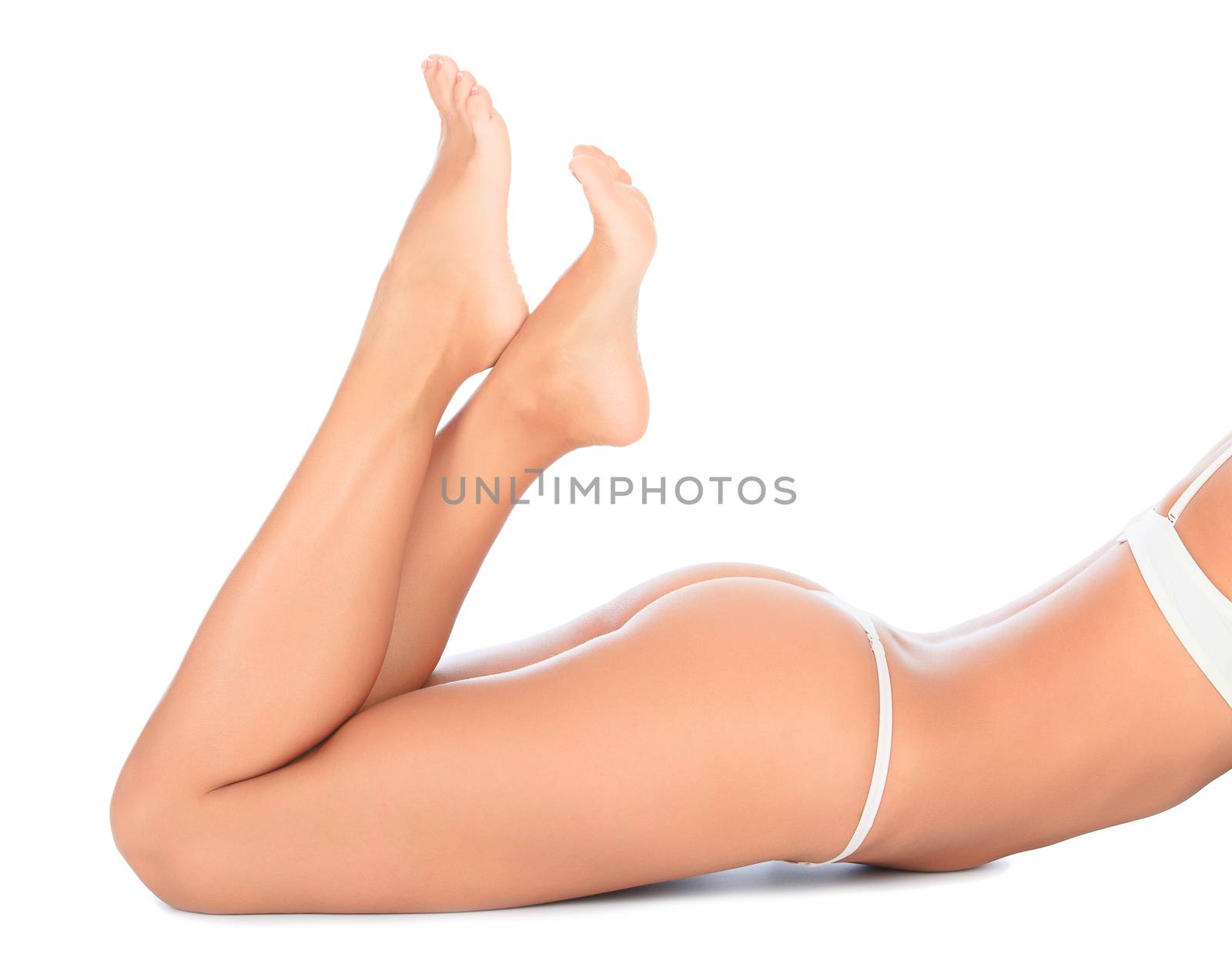 Woman laying on the white floor. Copyspace