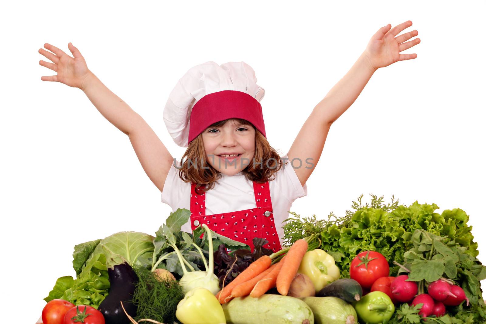 happy little girl cook with vegetables by goce