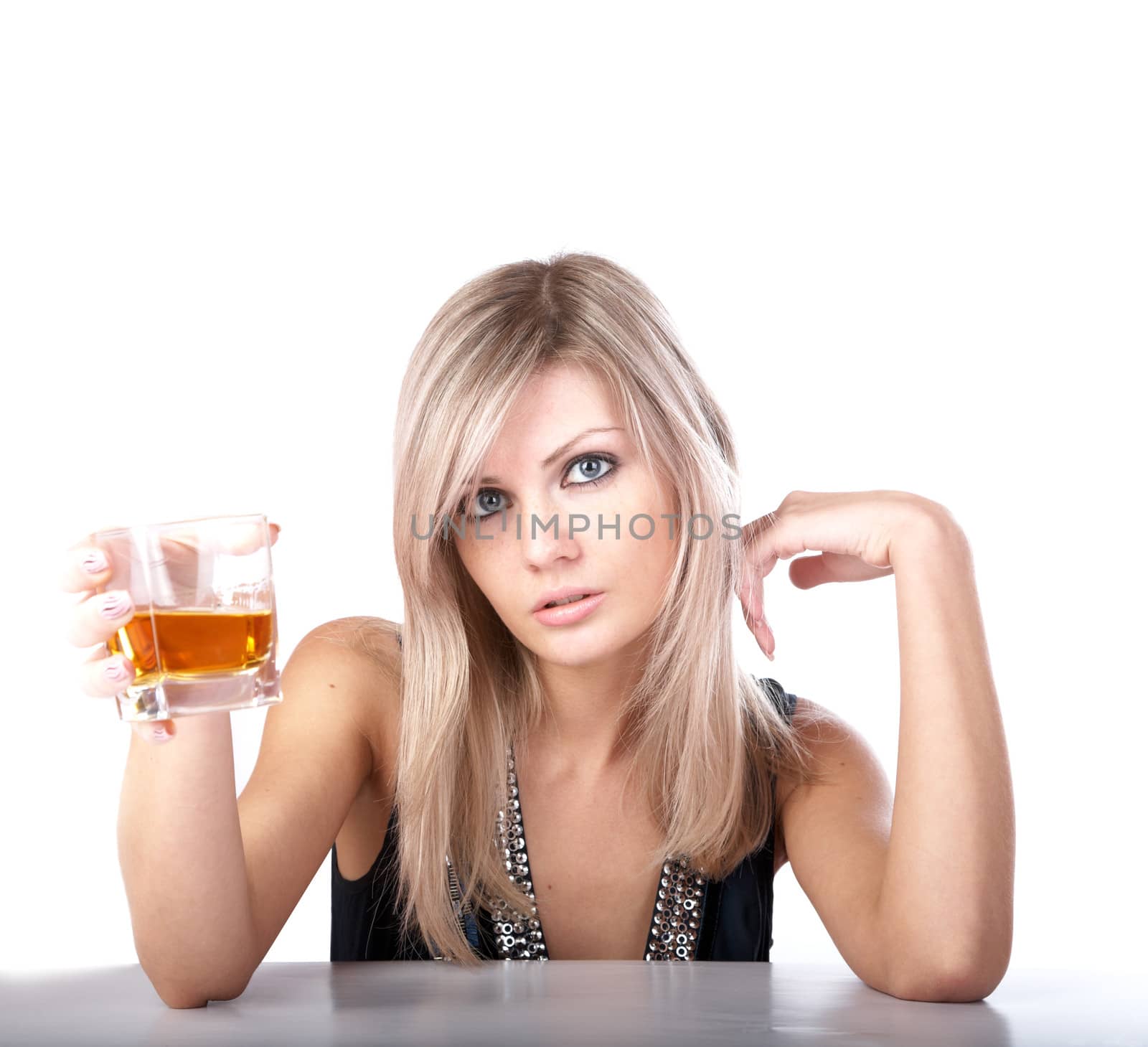 The girl with  glass of whisky on a white background