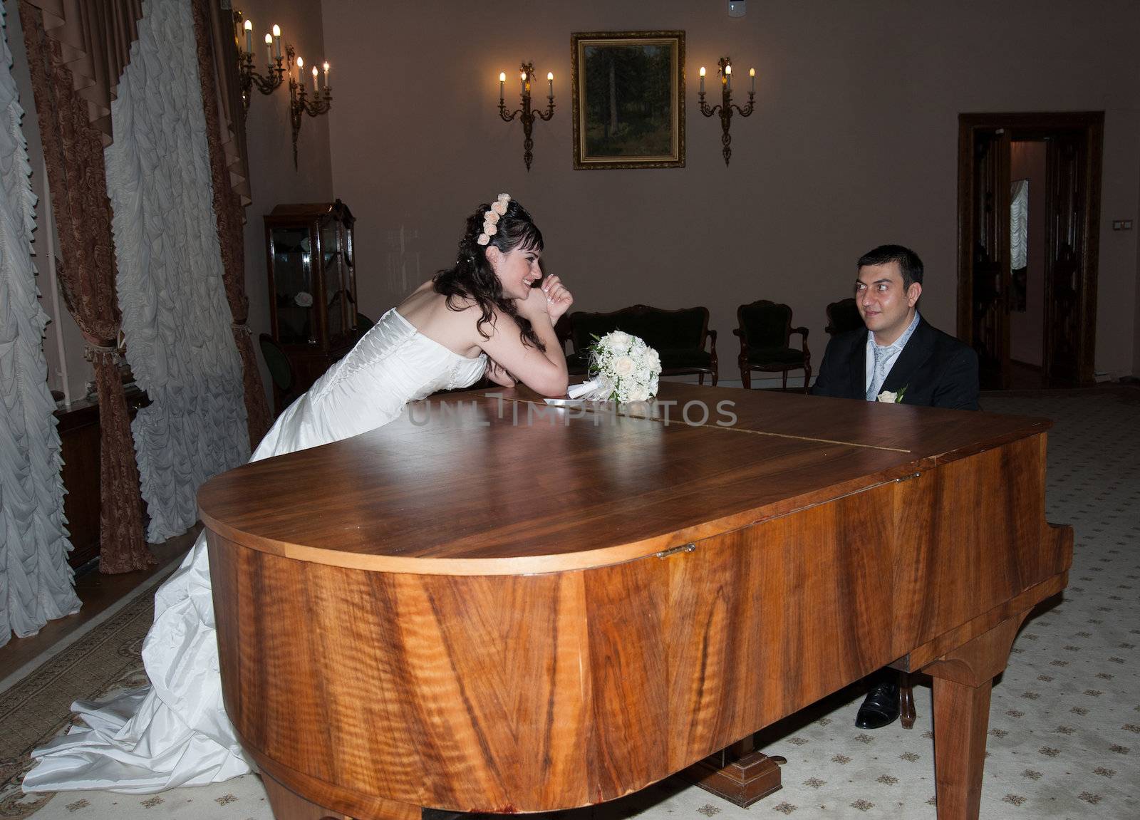 bride groom plays the piano by raduga21