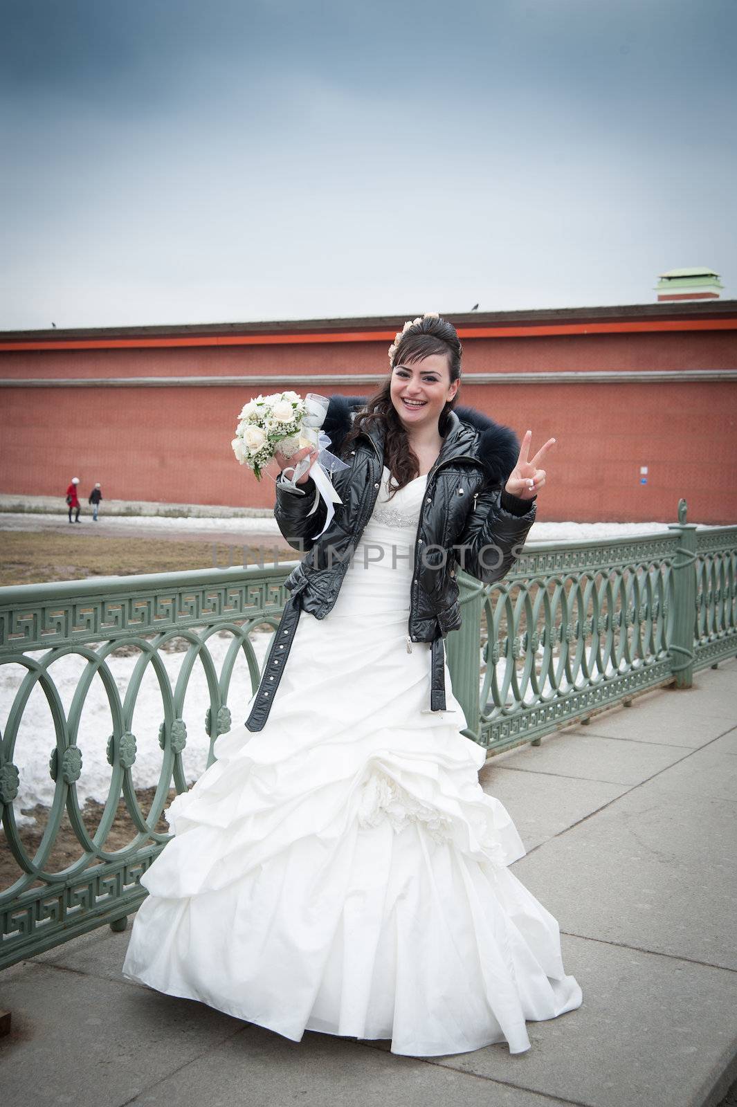 bride walks around the city