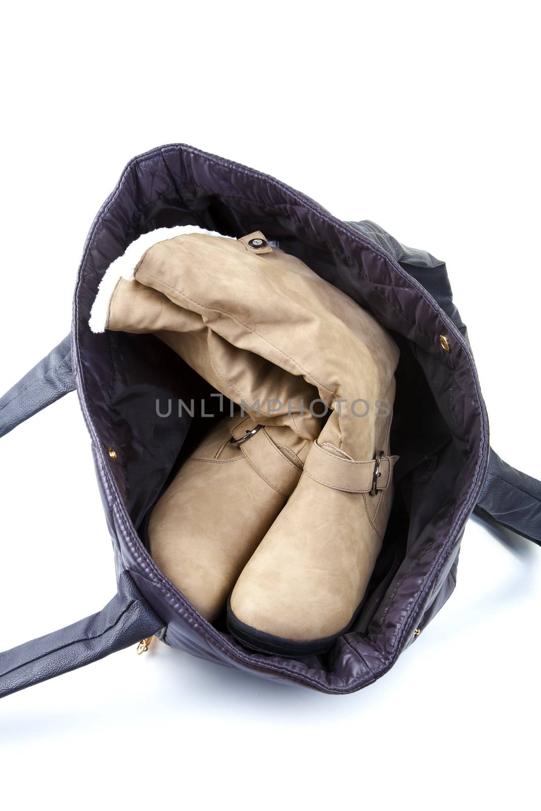 Female bag with winter boots on a white background by alarich