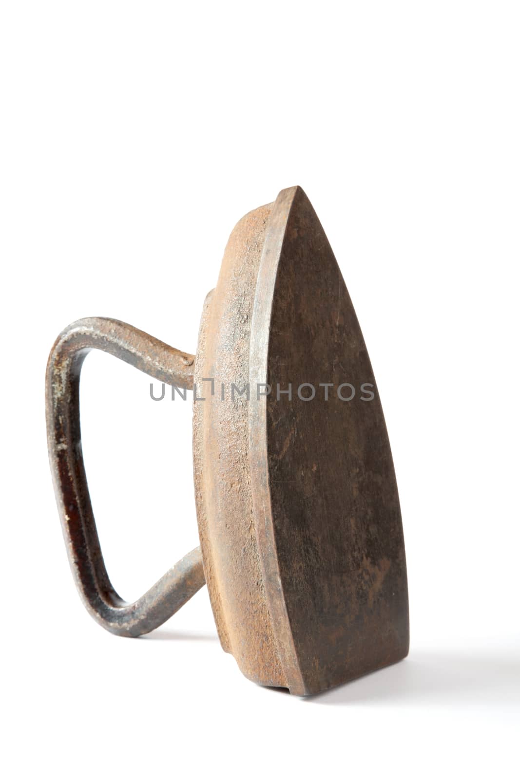 The old iron covered with rust on a white background