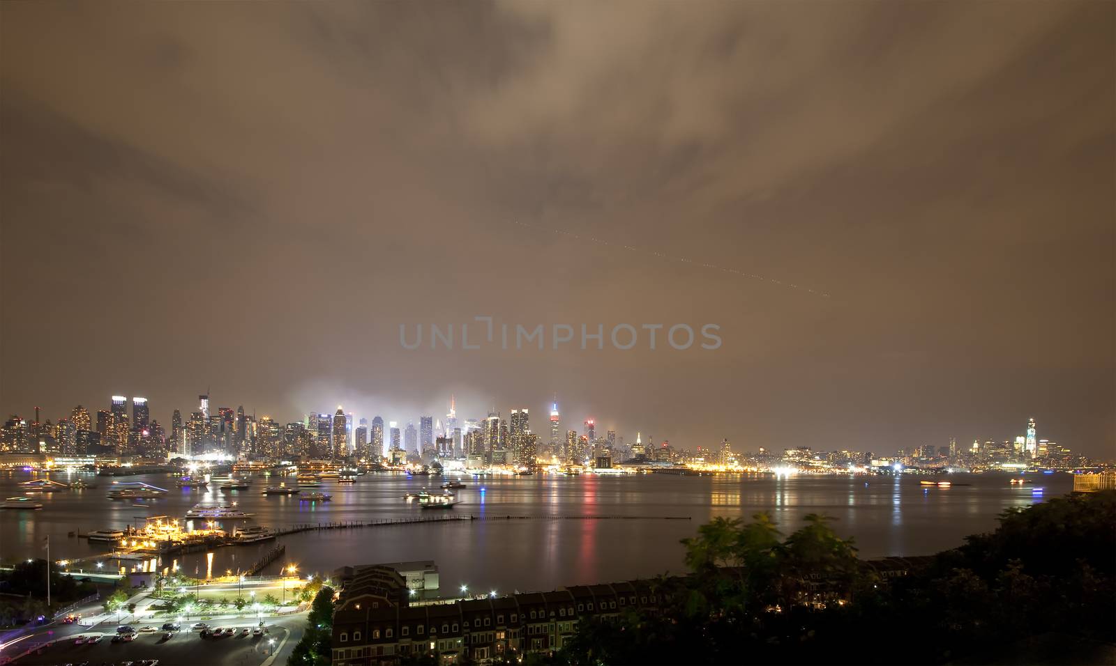 The panoramic view of the complete Manhattan Island at night from New Jersey side