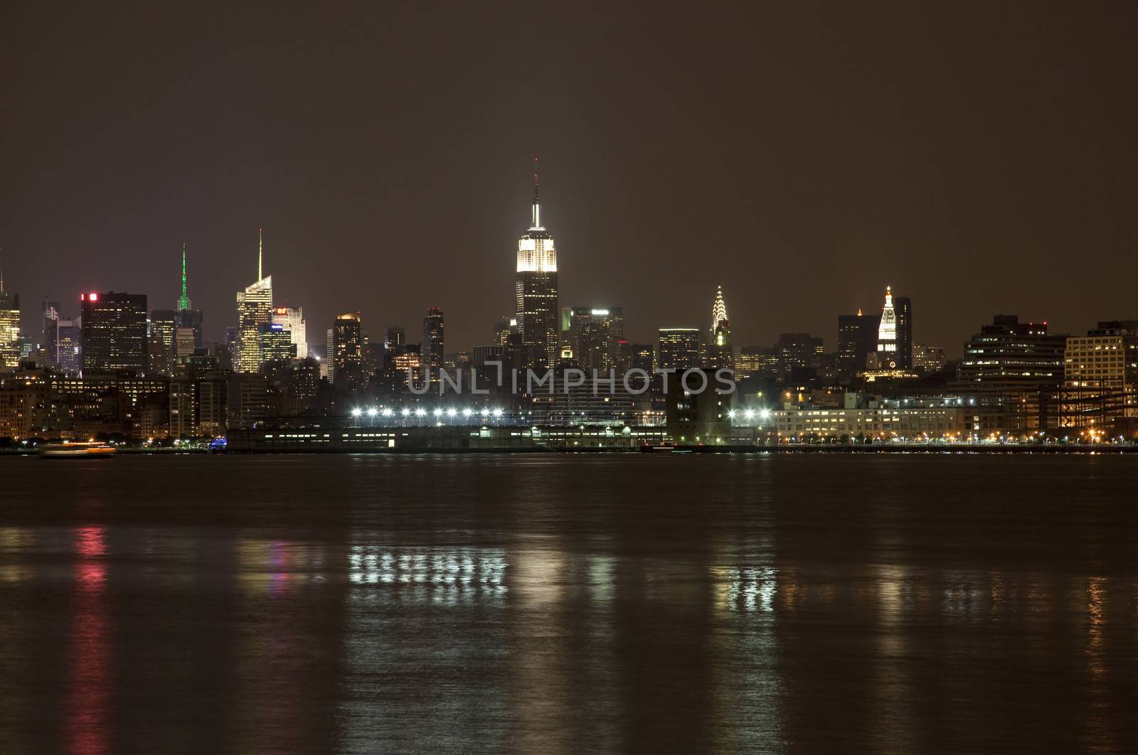 The New York City mid-town skylines at night 