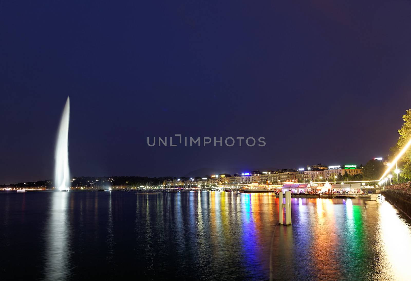 Geneva water jet on Lake Leman at night by gary718