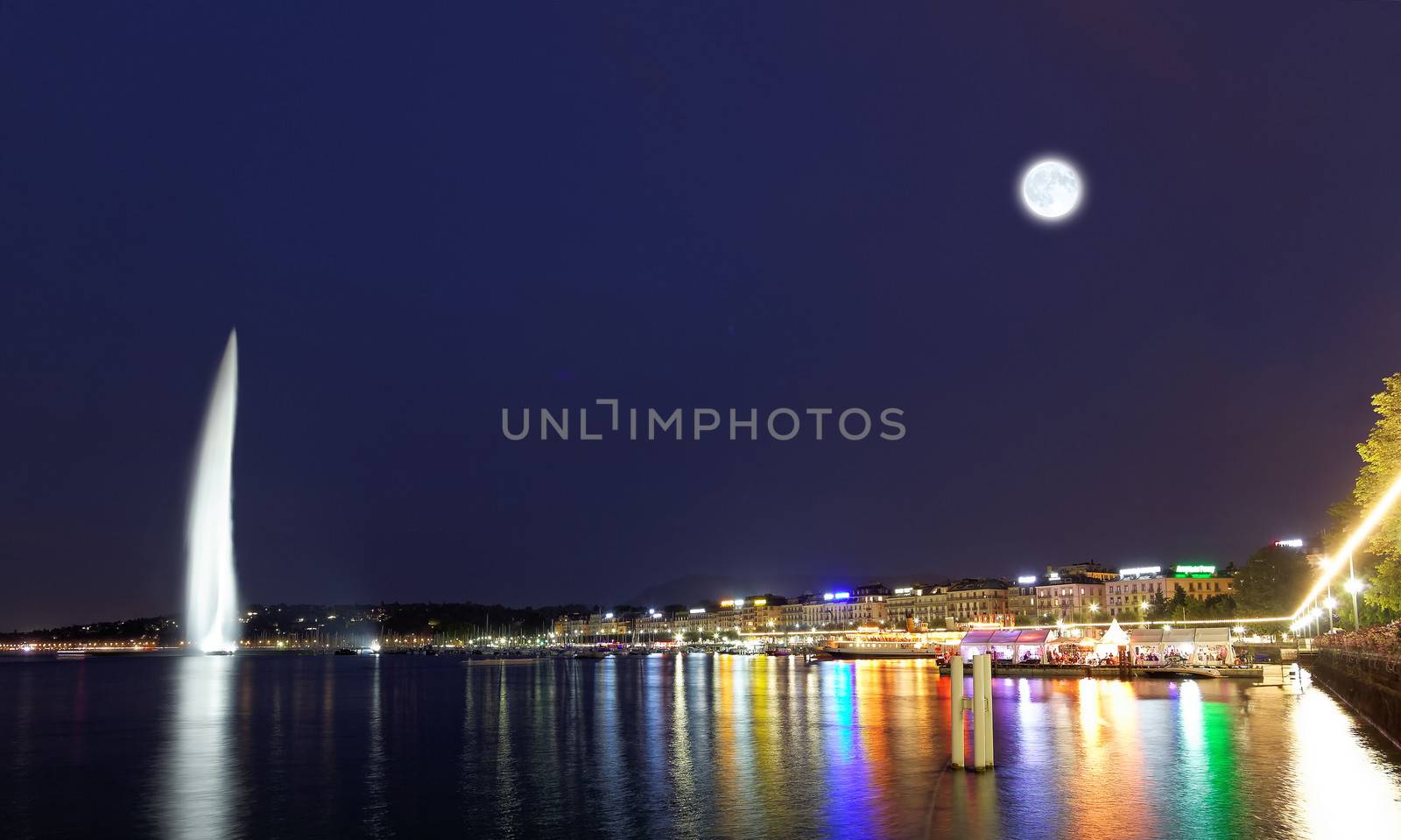 Geneva water jet on Lake Leman at night by gary718