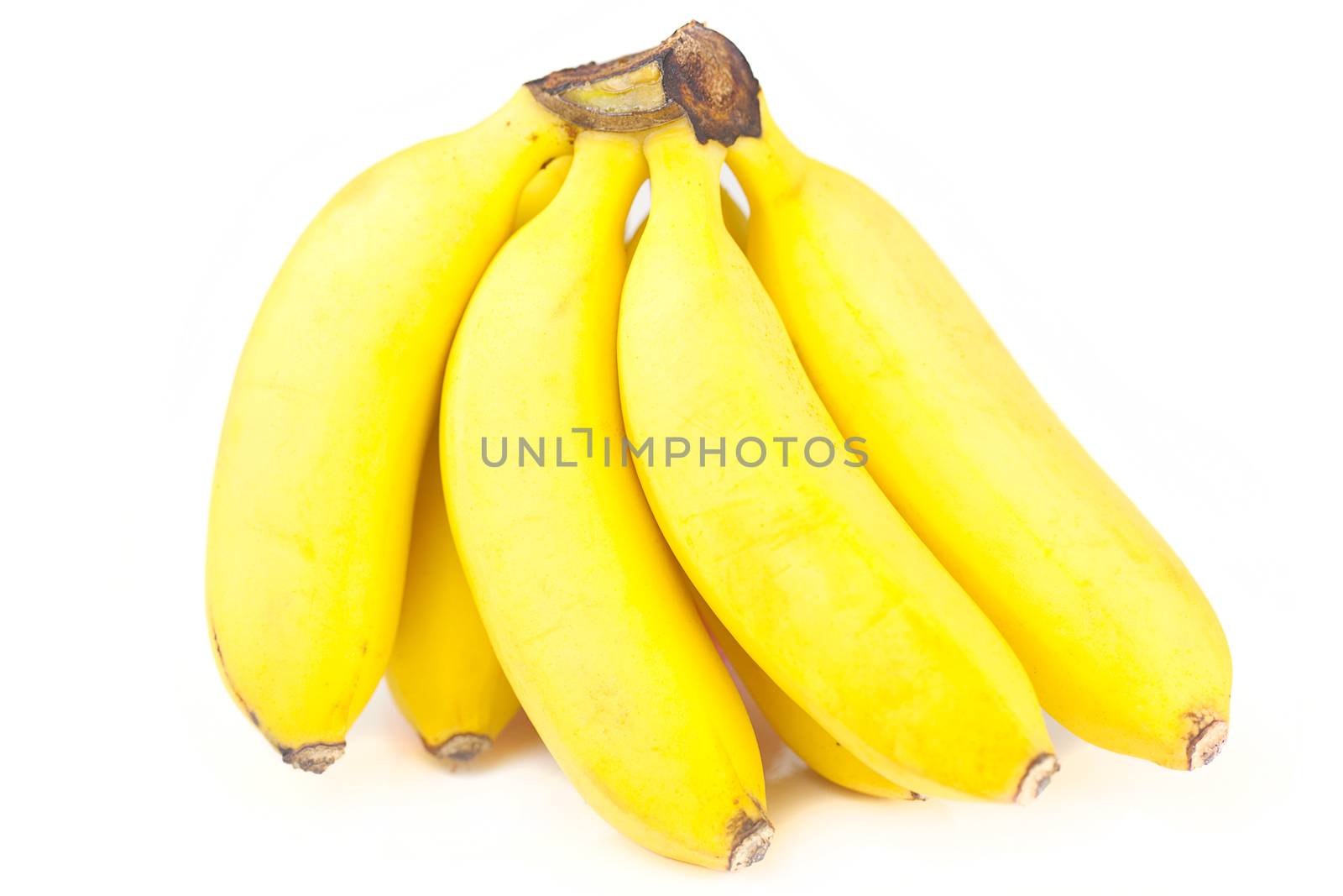 bunch of bananas isolated on white by jannyjus