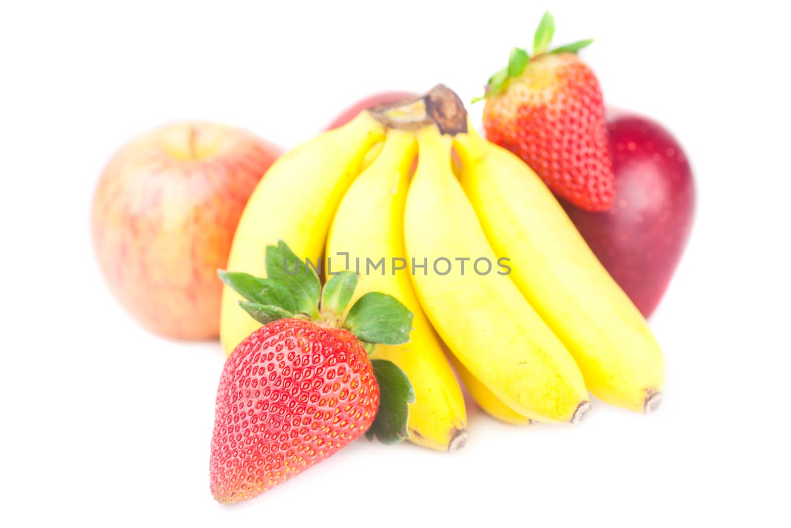 bunch of bananas,apples and strawberry isolated on white by jannyjus