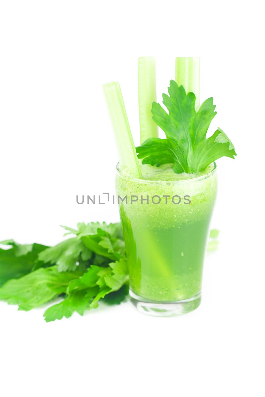 celery and glass with celery juice isolated on white