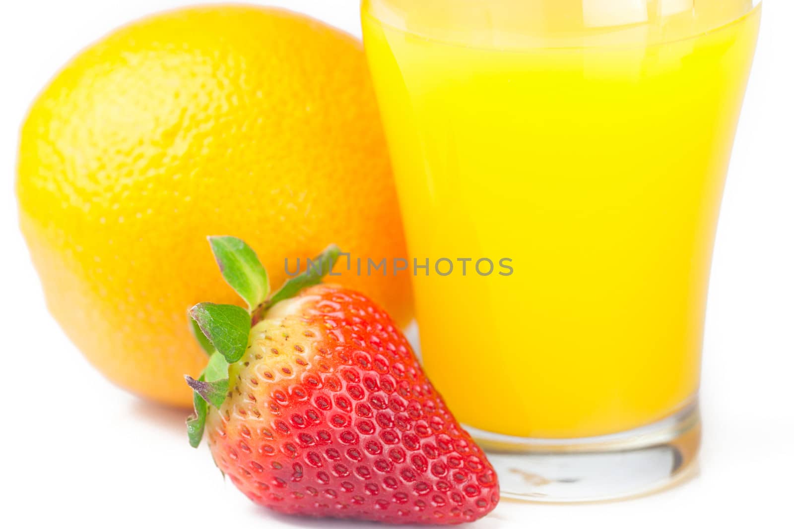 strawberry,orange and a glass of orange juice isolated on white
