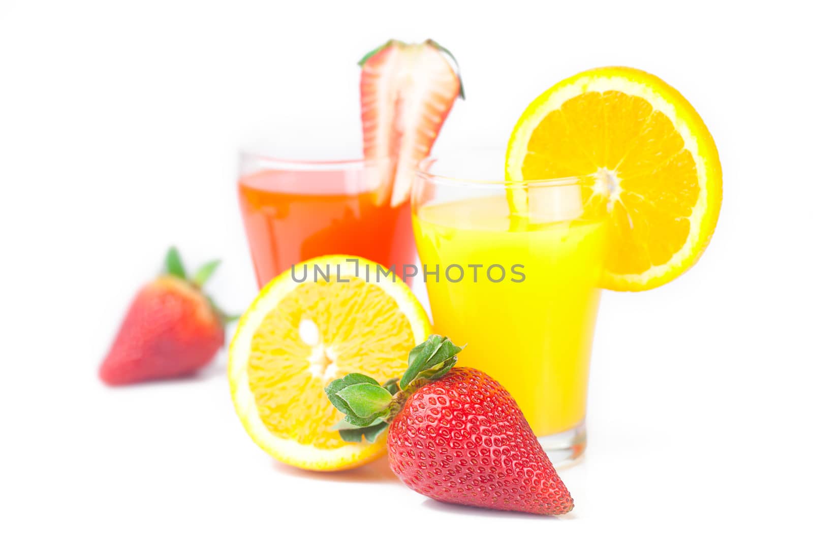orange, glass of orange juice, strawberries and glass of strawbe by jannyjus