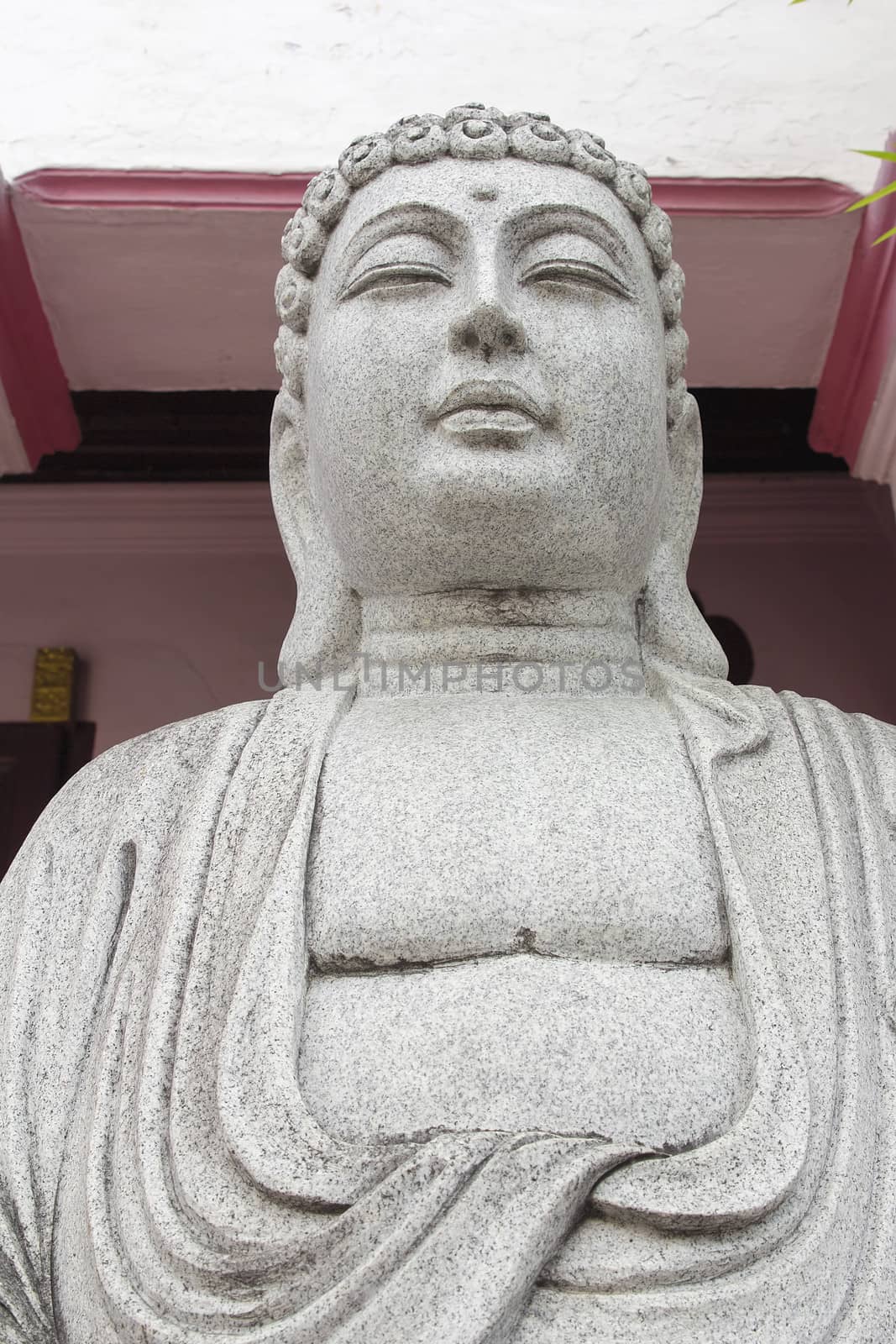 Stone Carved Buddha Sculpture at Temple Exterior Closeup