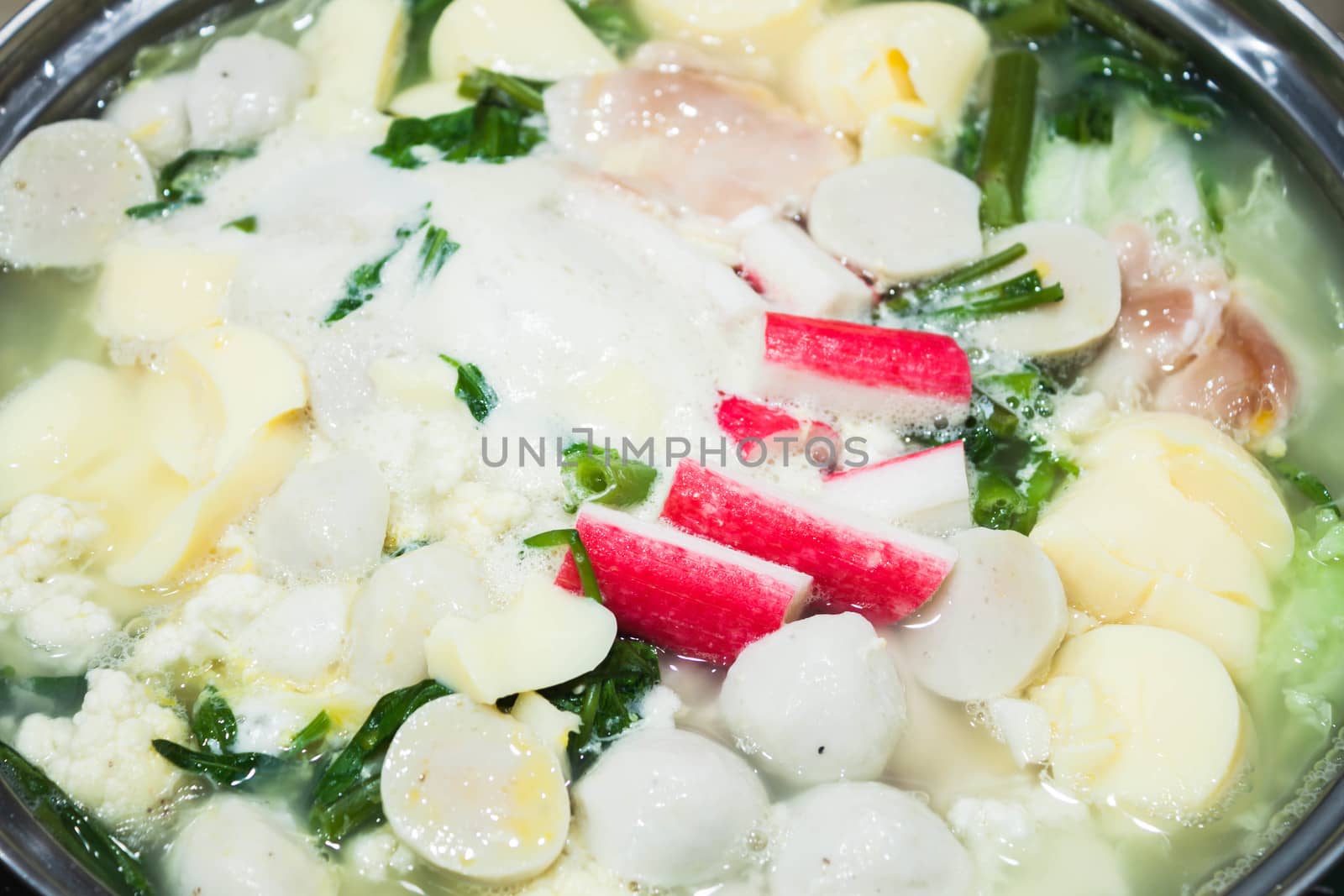 Boiling suki soup in big bowl, stock photo