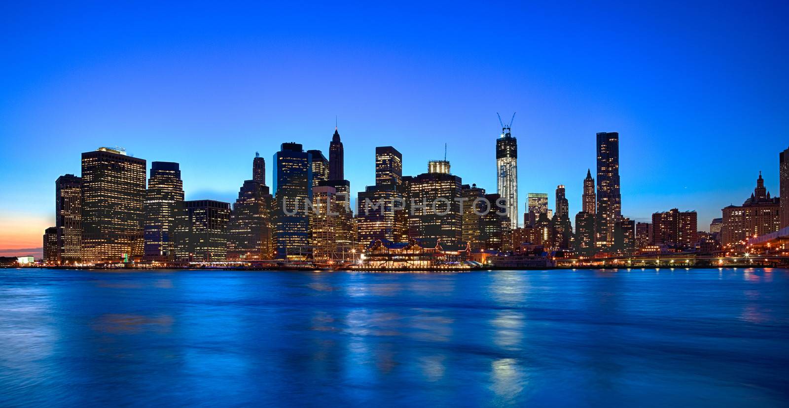 New York City skyline at twilight w the Freedom tower