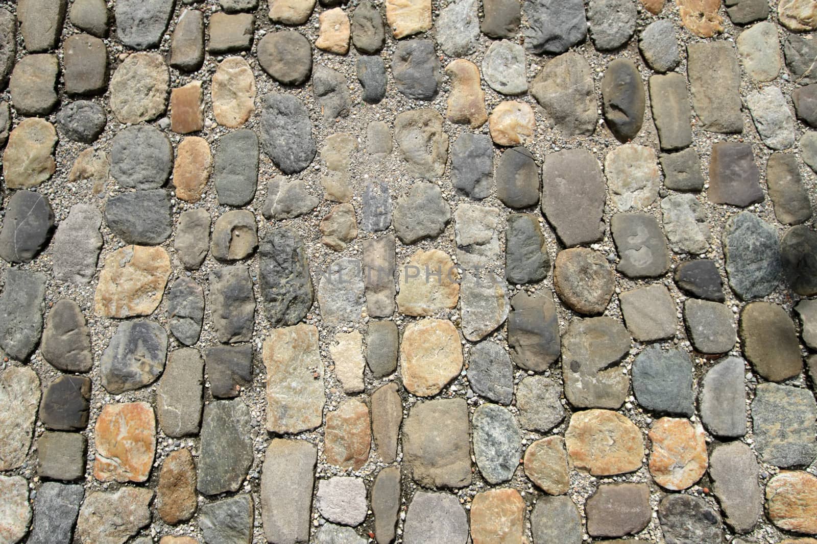 European old style cobble stones pavement background texture