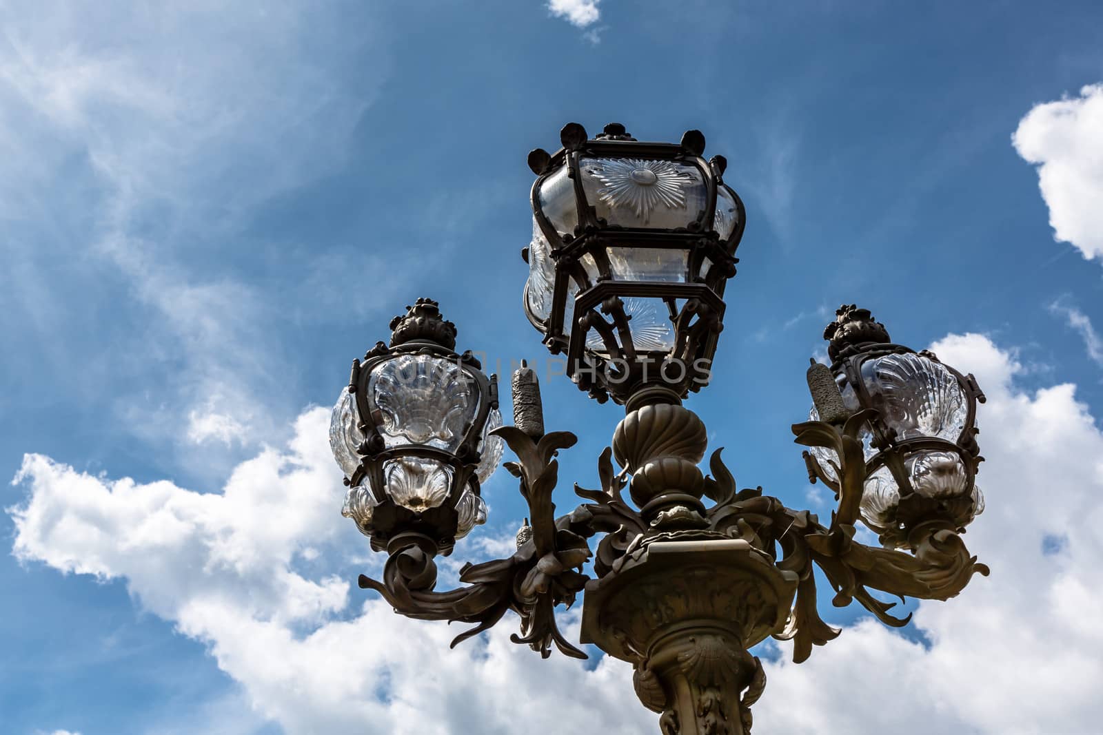 Street Lantern on the Alexandre III Bridge against Cloudy Sky, Paris, France.