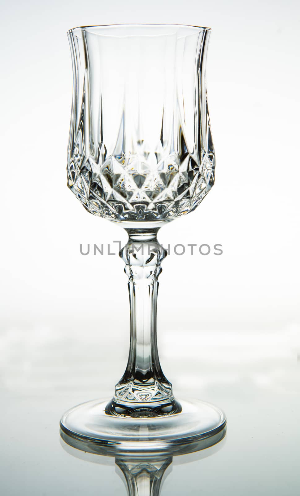 Empty wine glass. isolated on a white background  by thanomphong