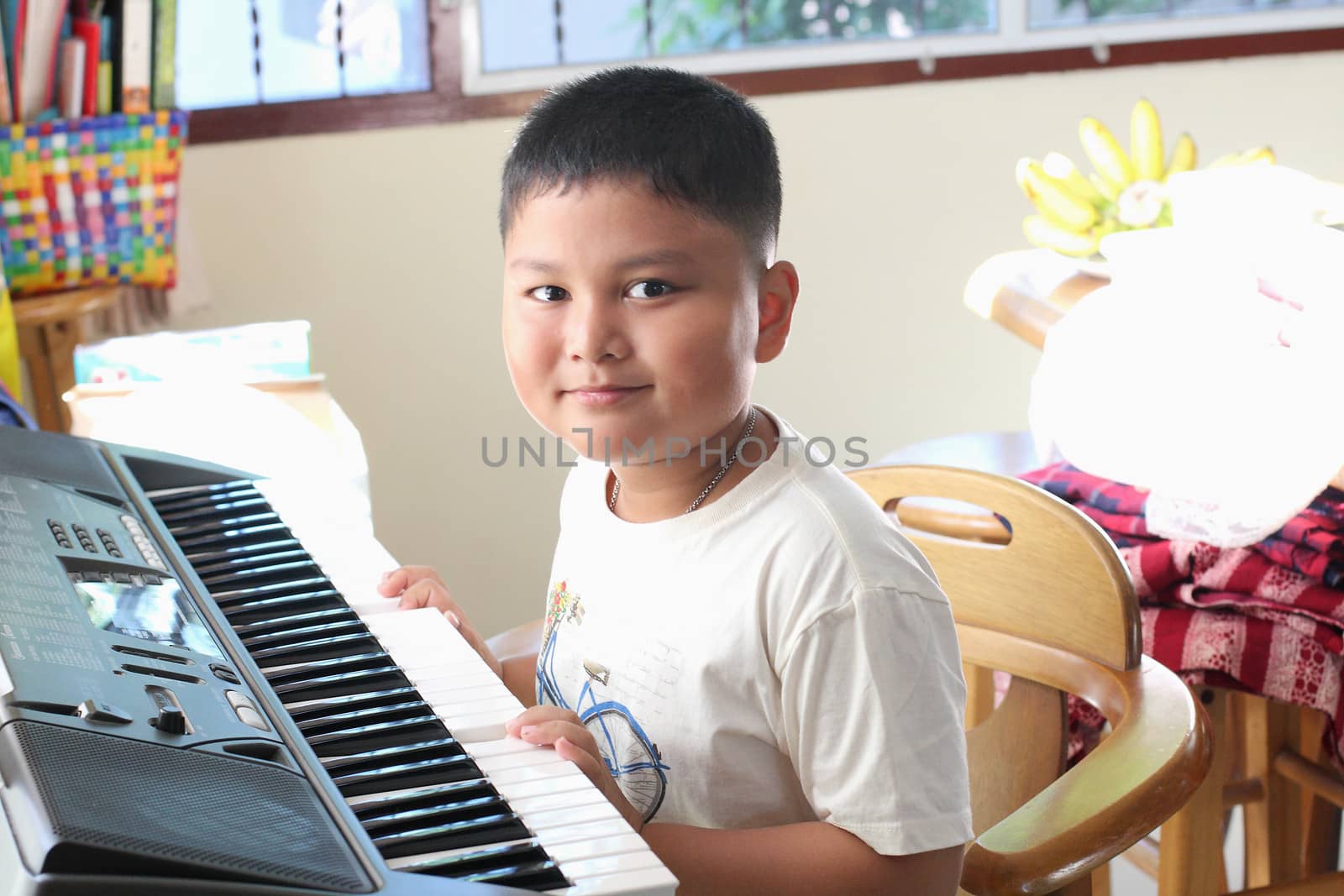 Little Boy playing piano fun