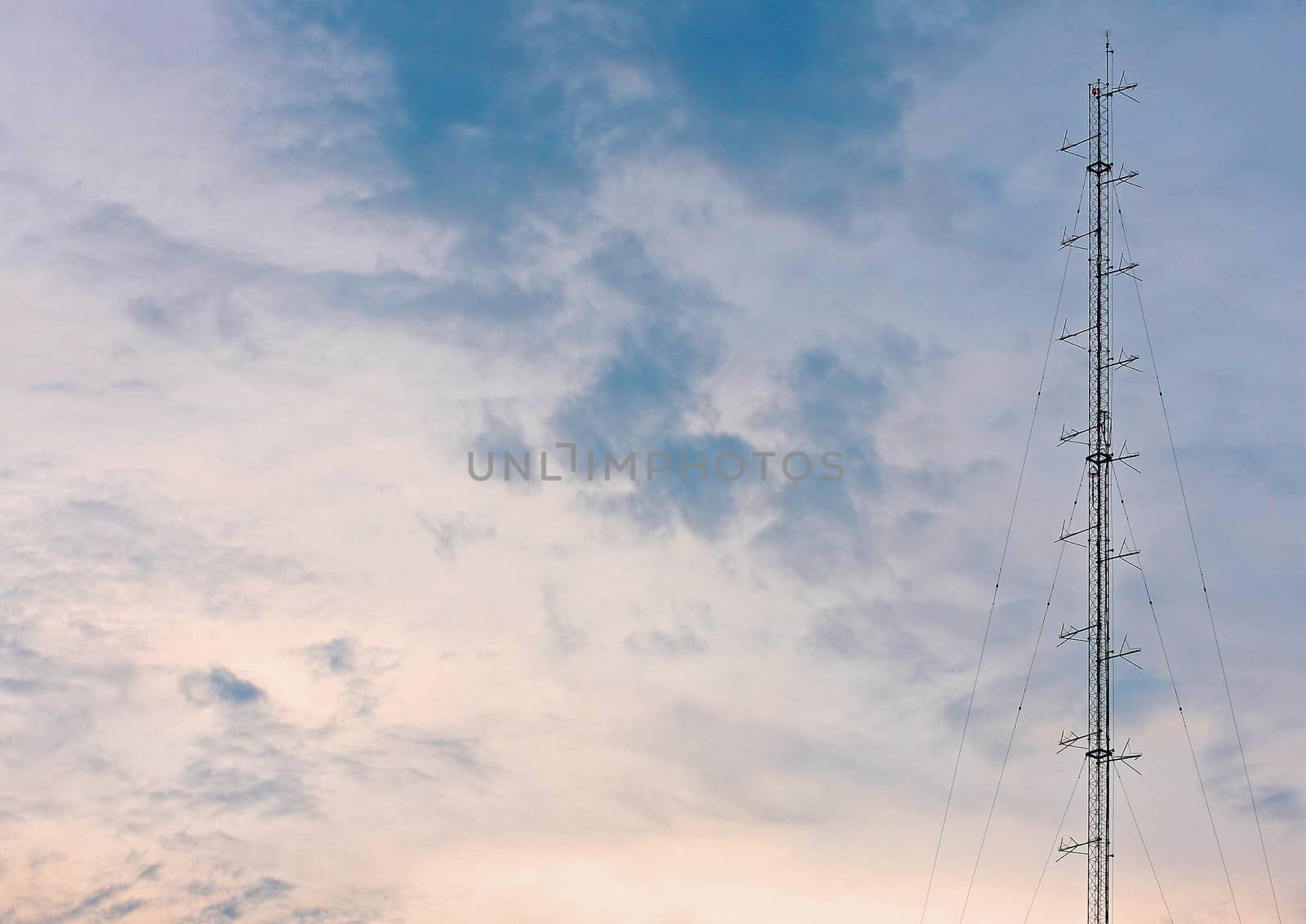 Phone antenna tower of the base phone station on sky