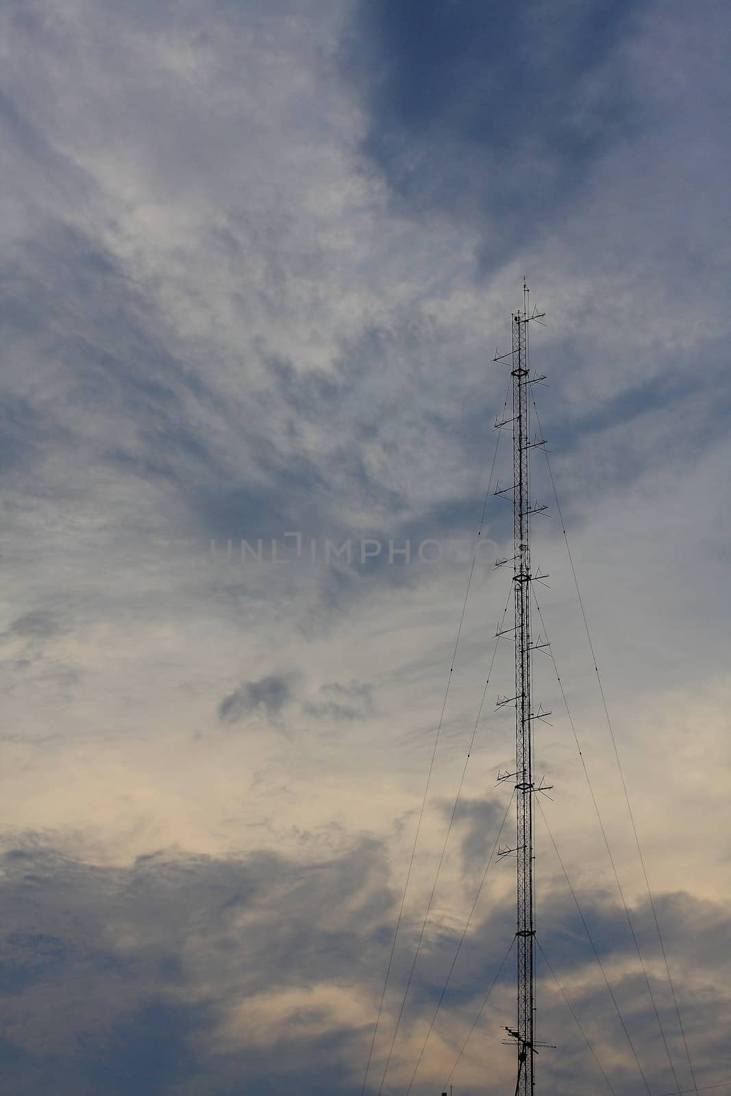 Phone antenna tower of the base phone station on sky by myrainjom01