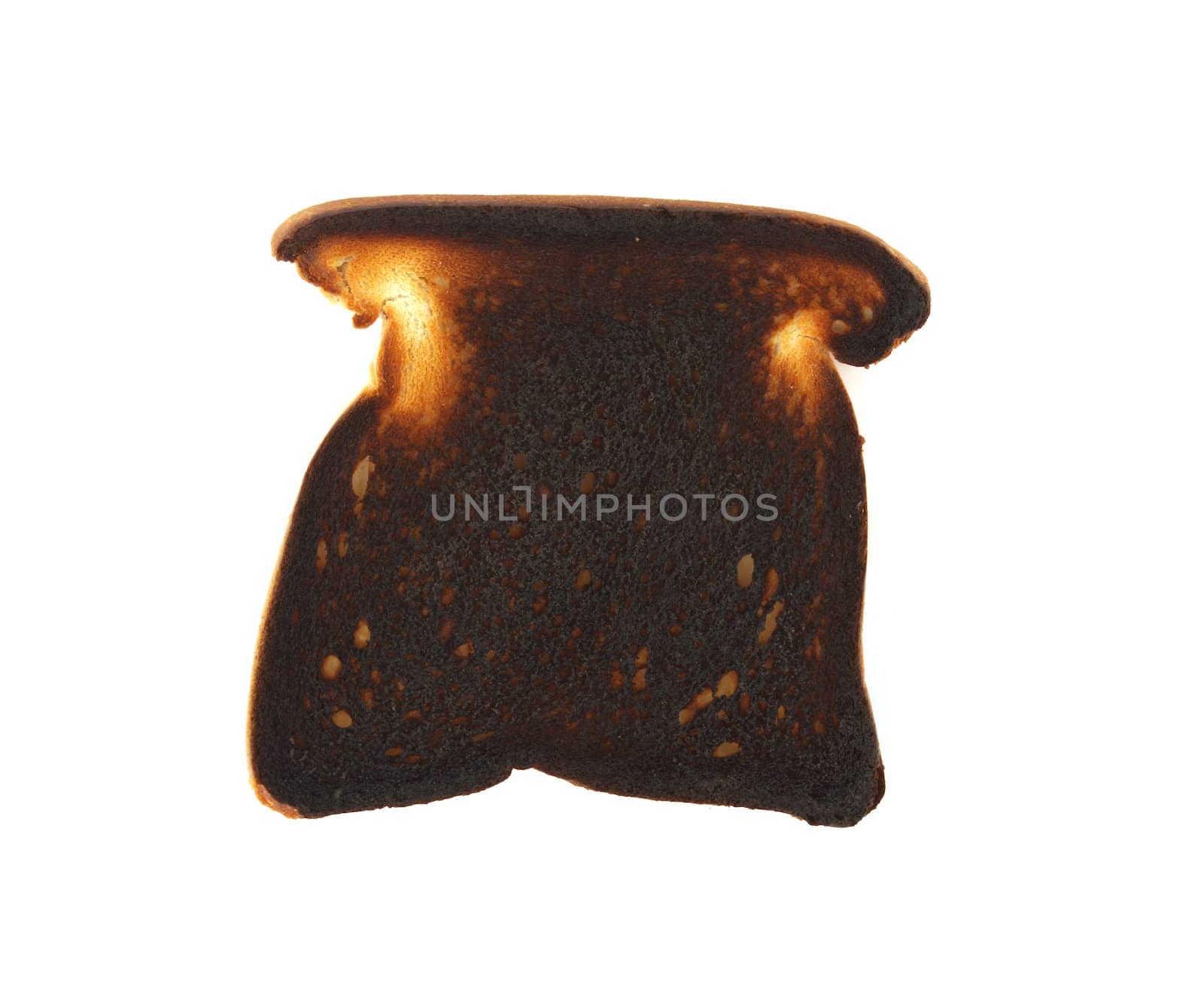 A piece of very burnt toast on white.
