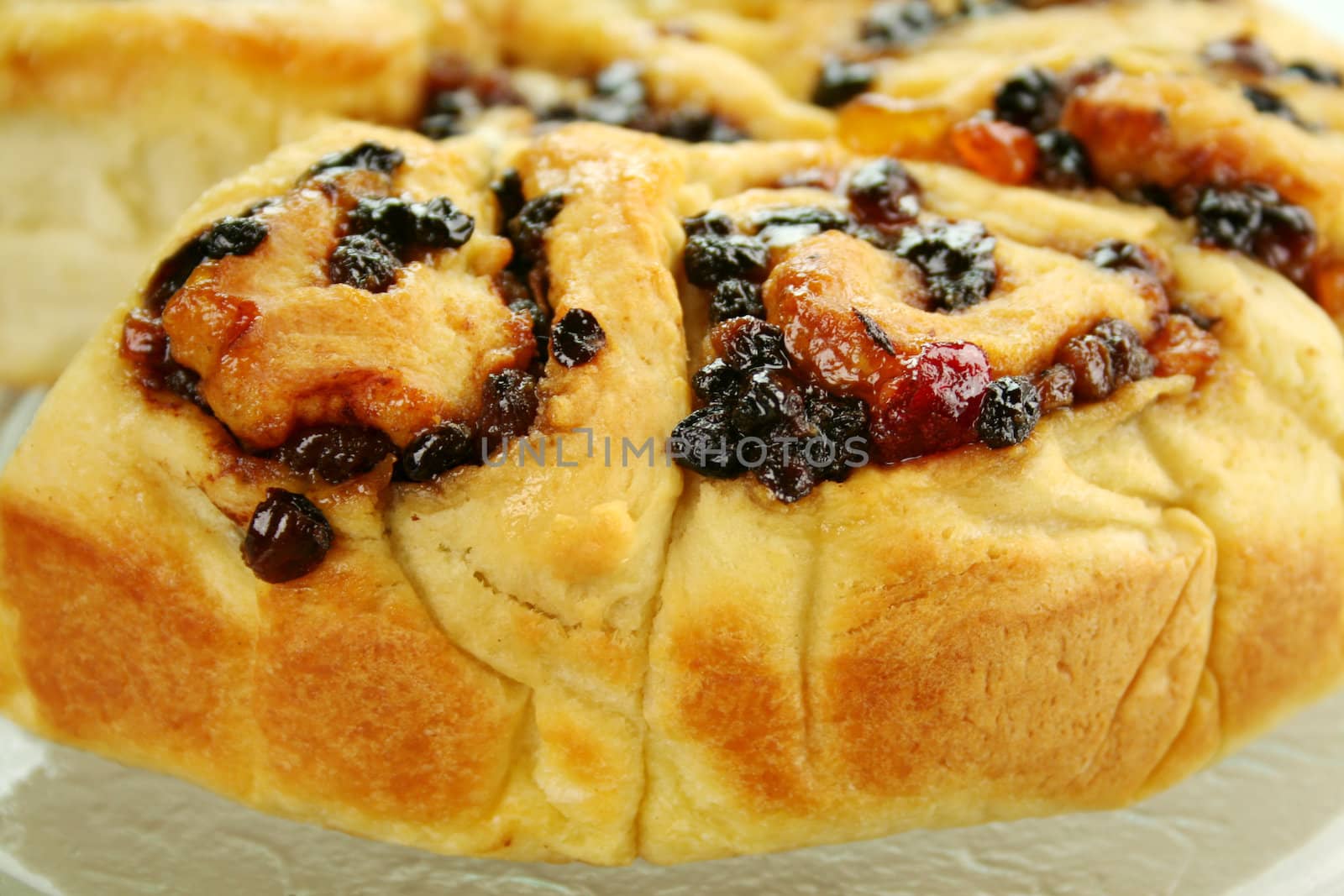 Delicious chelsea bun with dried fruit ready to serve.