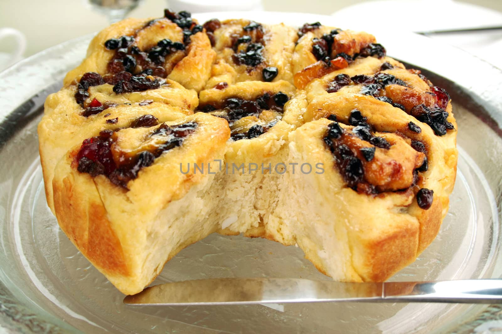 Delicious chelsea bun with dried fruit ready to serve.