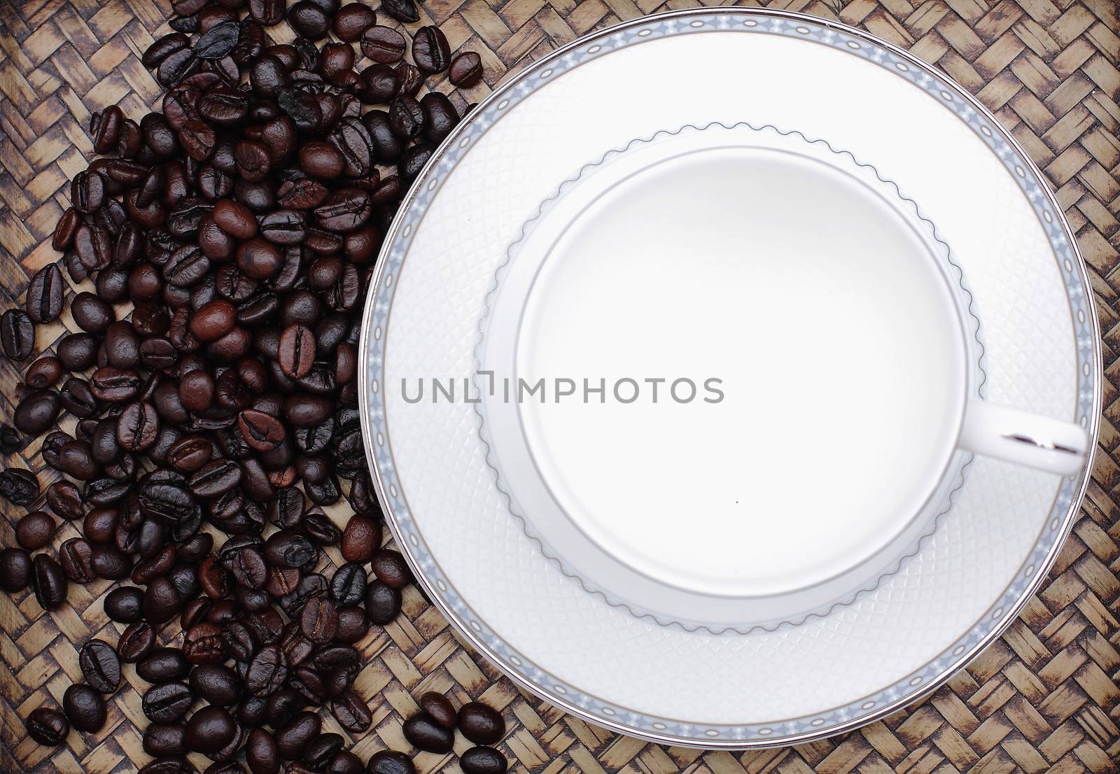 Coffee beans in a glass. Bamboo background by myrainjom01