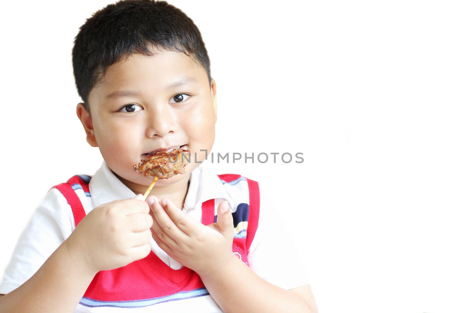 The boy eating a delicious pork. by myrainjom01