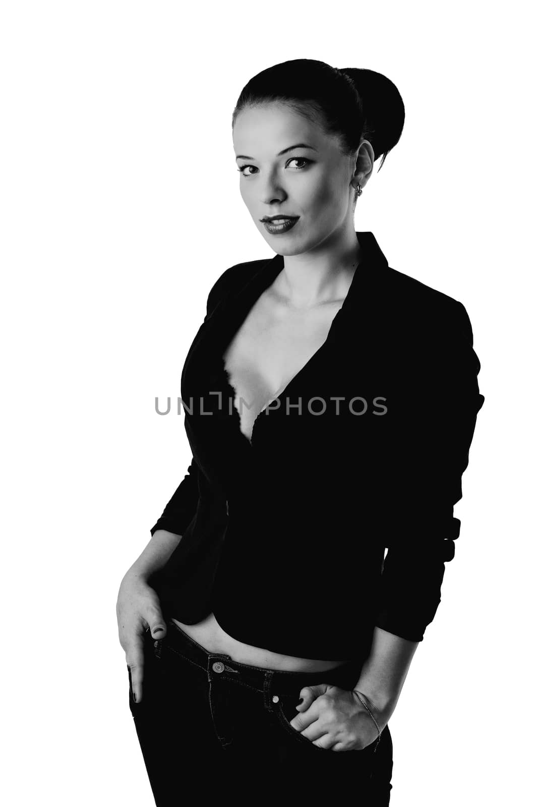 Girl in a jacket and jeans isolated on white background. Black-and-white photo