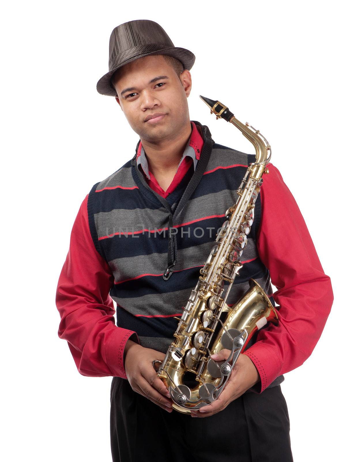 A three quarter view of a young saxophonist is shown.