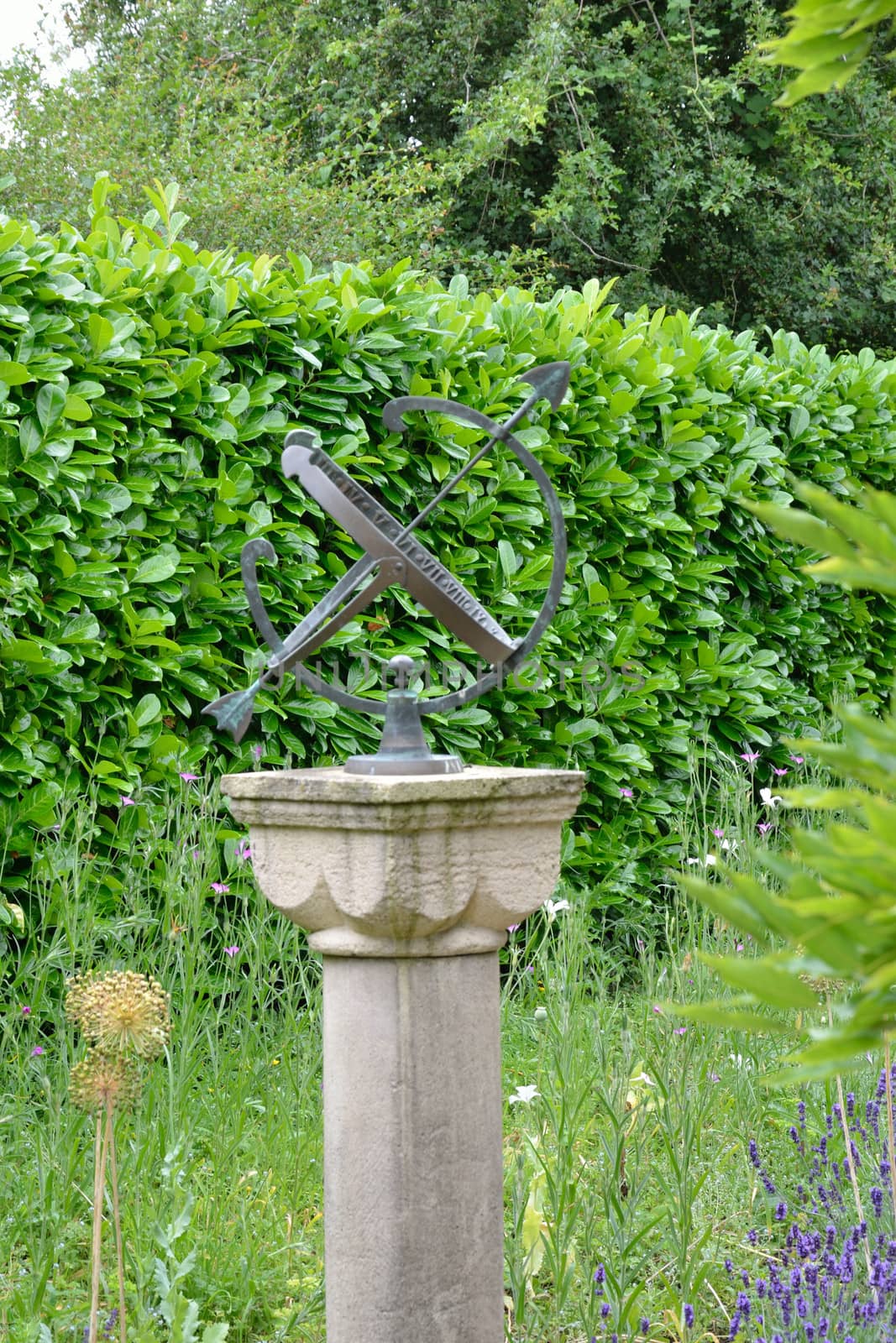 Sundial in formal garden