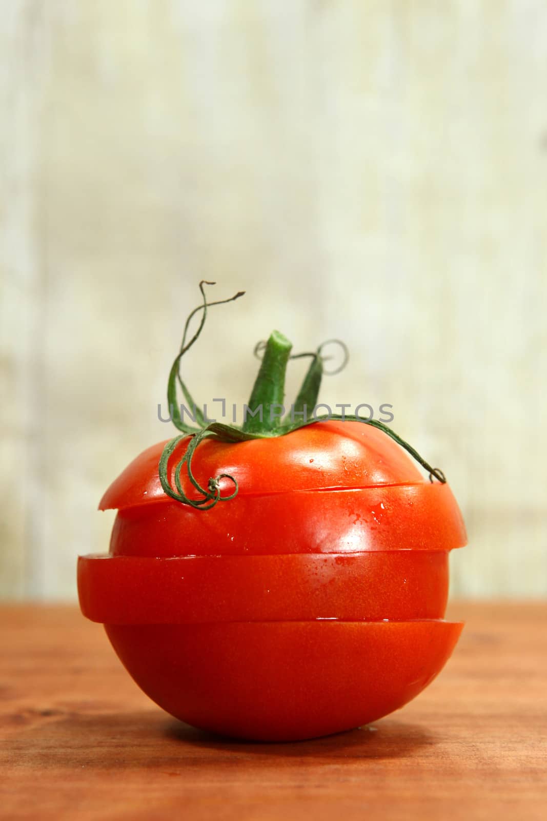 Tomatoes on a Rustic Wood Plank by tobkatrina