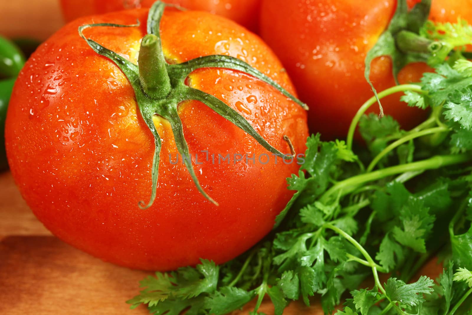 Tomatoes on a Rustic Wood Plank by tobkatrina