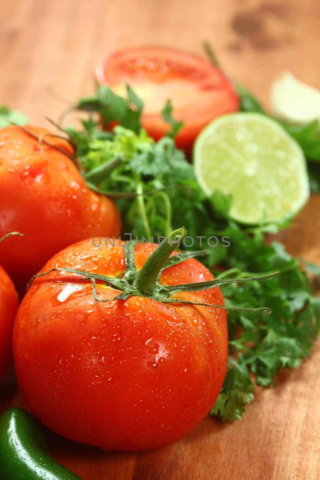 Tomatoes on a Rustic Wood Plank by tobkatrina