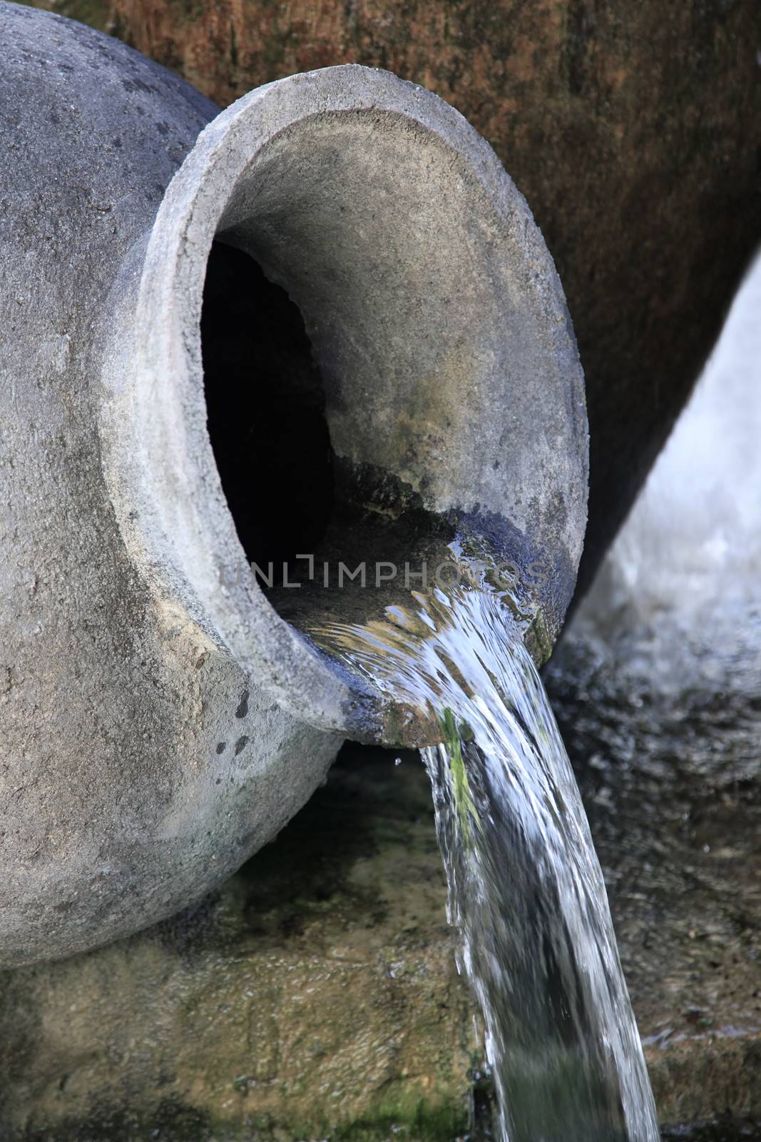 Fountain in the form of the old turned jug 