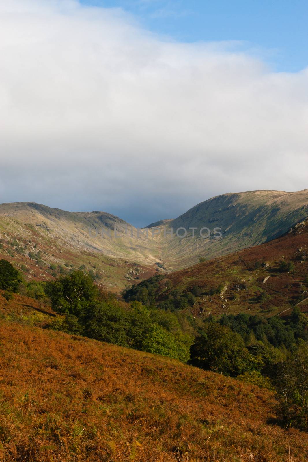 View over hills and valley in National Park, The Lake District, Cumbria. Taken on an Autumn day.
