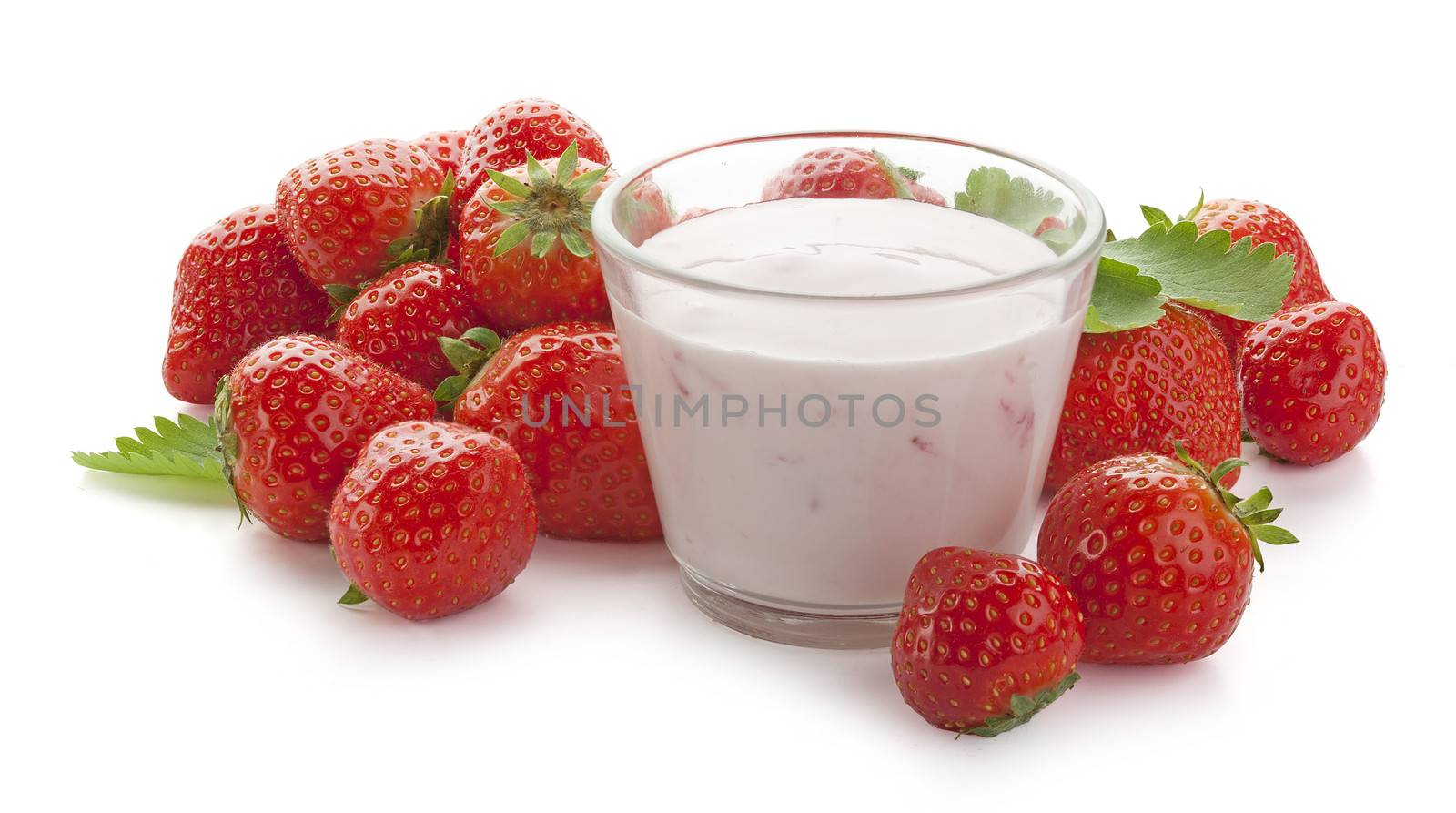 Glass with yoghurt and strawberries with leaf