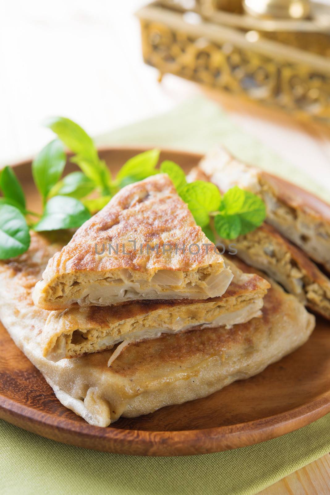 Malaysia muslim food Martabak or murtabak on dining table.