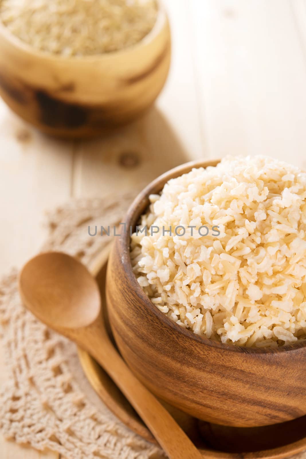 India cooked organic basmati brown rice in wooden bowl.