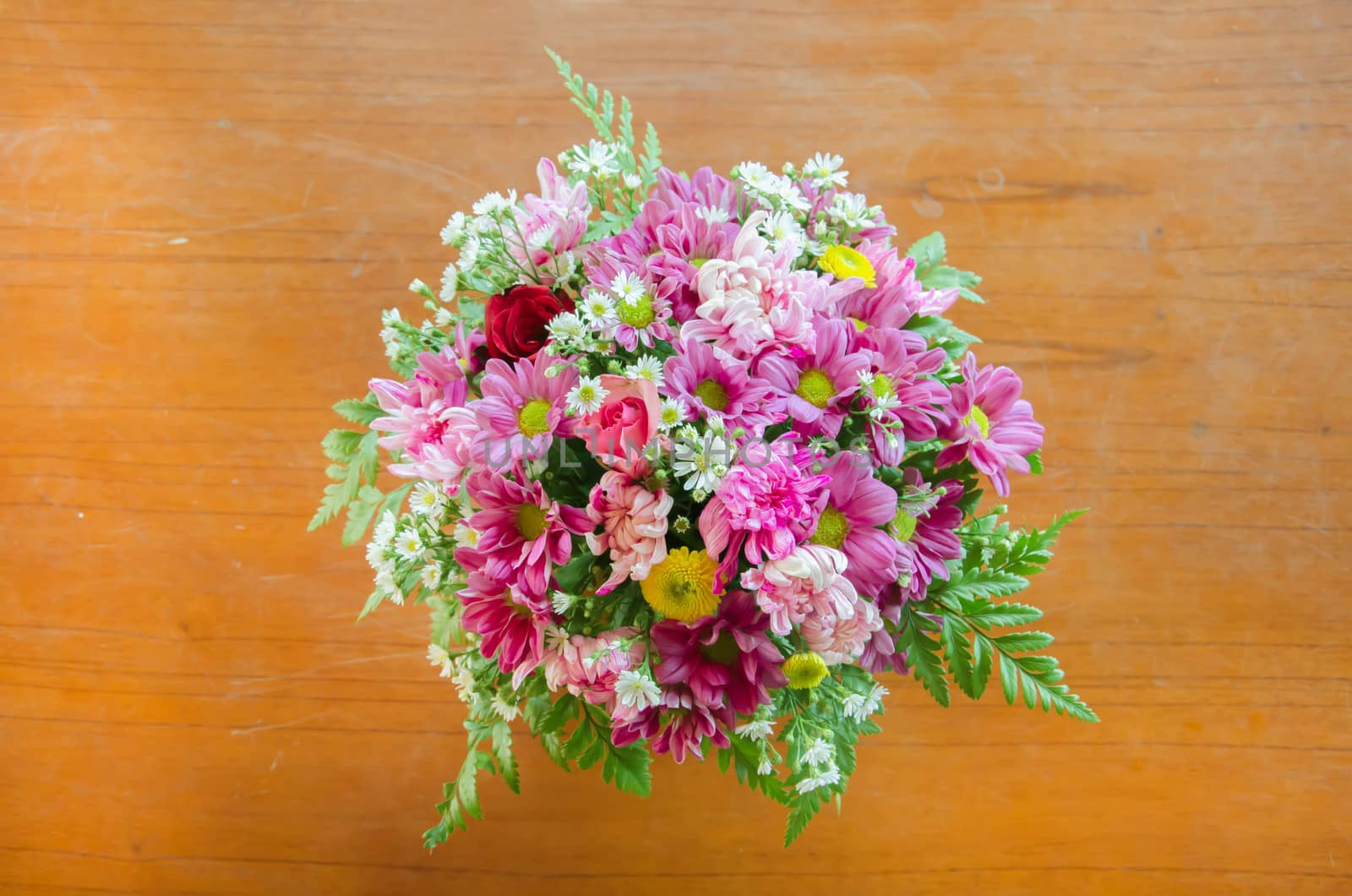top view bouquet mix  of colorful  flowers  on table