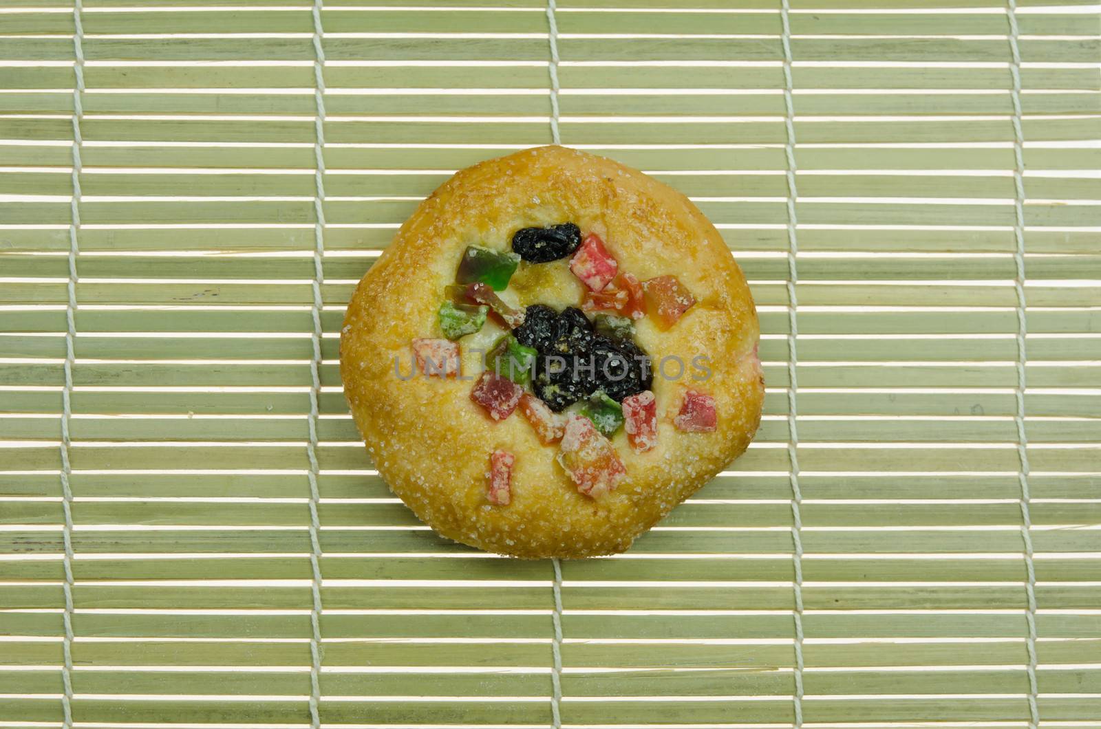  bread with raisin and  dried fruits on wooden background